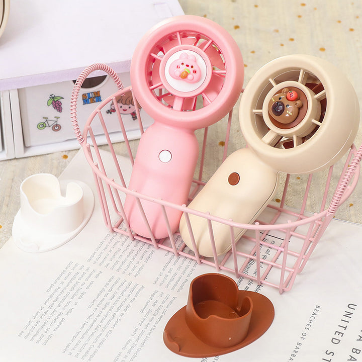 Unisex portable hand fan with cute bear figure rechargeable battery quiet motor and table stand Kalsten