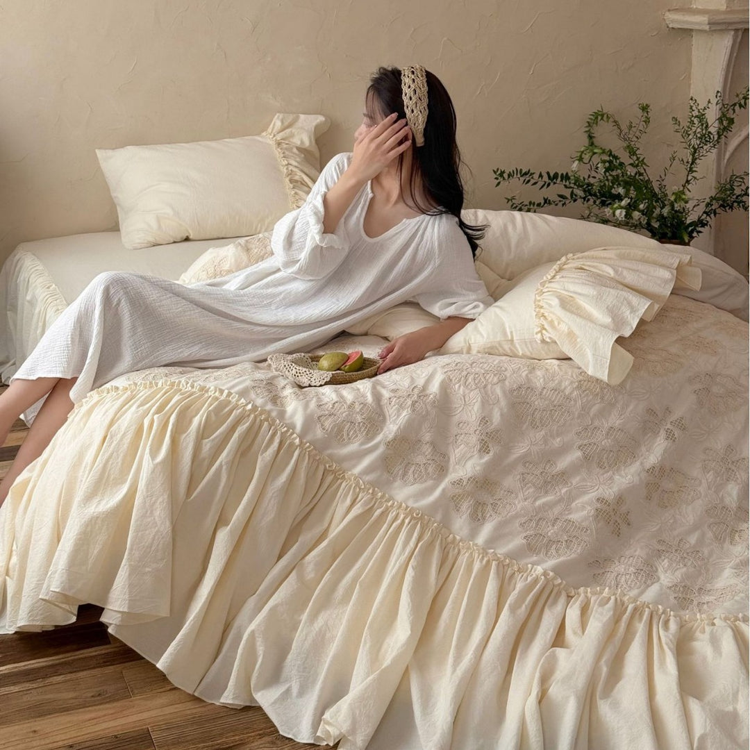 Vintage bedding set with ruffled bed skirt and embroidered bedspread