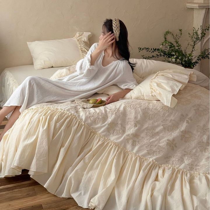Vintage bedding set with ruffled bed skirt and embroidered bedspread