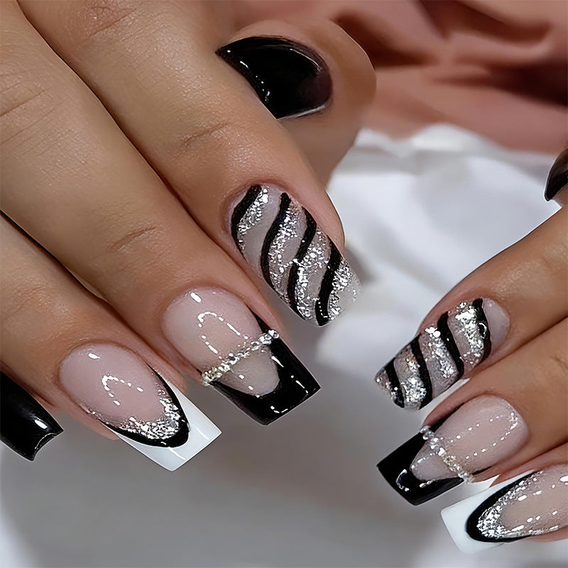 Artificial nail set with glamorous glitter and stripe designs Kalsten