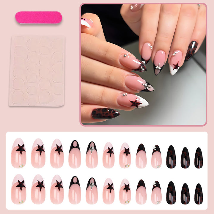 Acrylic nail set with creative star patterns and glitter accents Kalsten