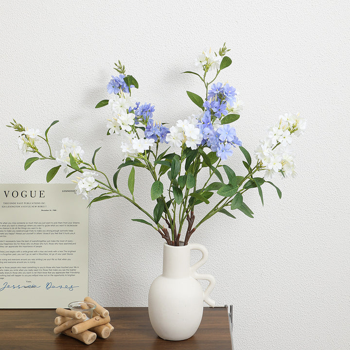 Decorative art branch with white flowers