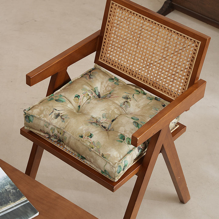 Padded seat cushion with tufting and bamboo motif
