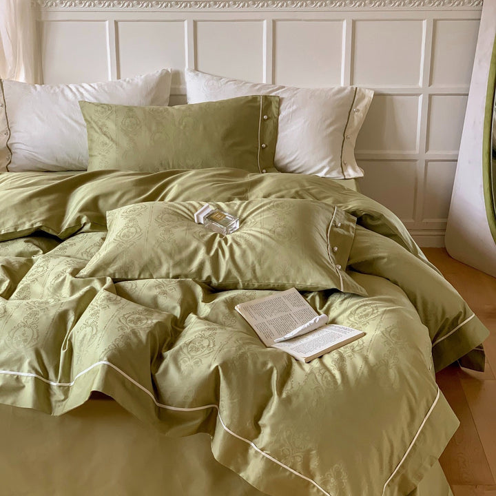 Luxurious cotton satin bed linen set with damask jacquard and contrasting piping