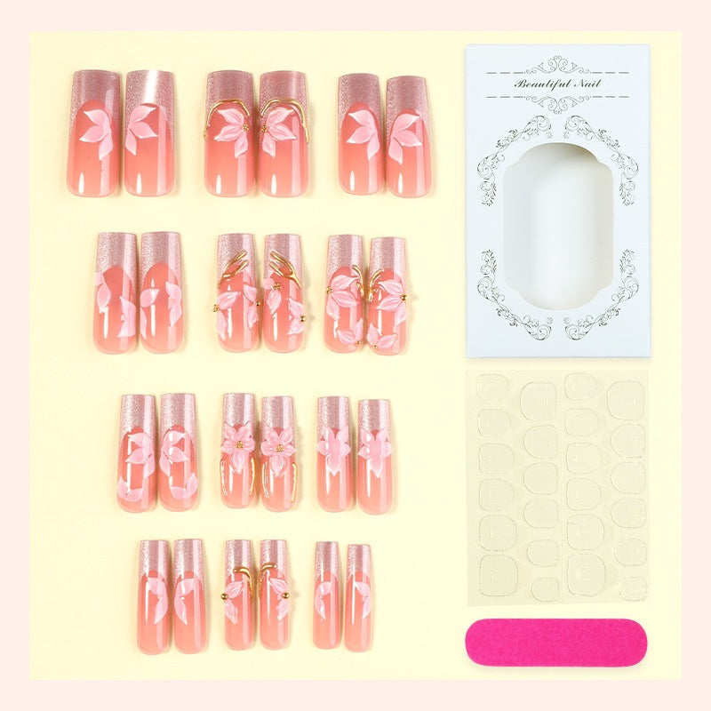 Elegant artificial nail set with floral designs and glitter accents Kalsten