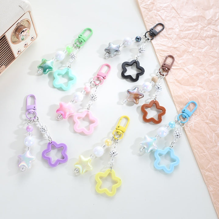 Playful keychain with floral and star motif Kalsten