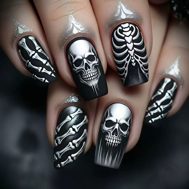 Creative artificial nails in spooky skull design Kalsten