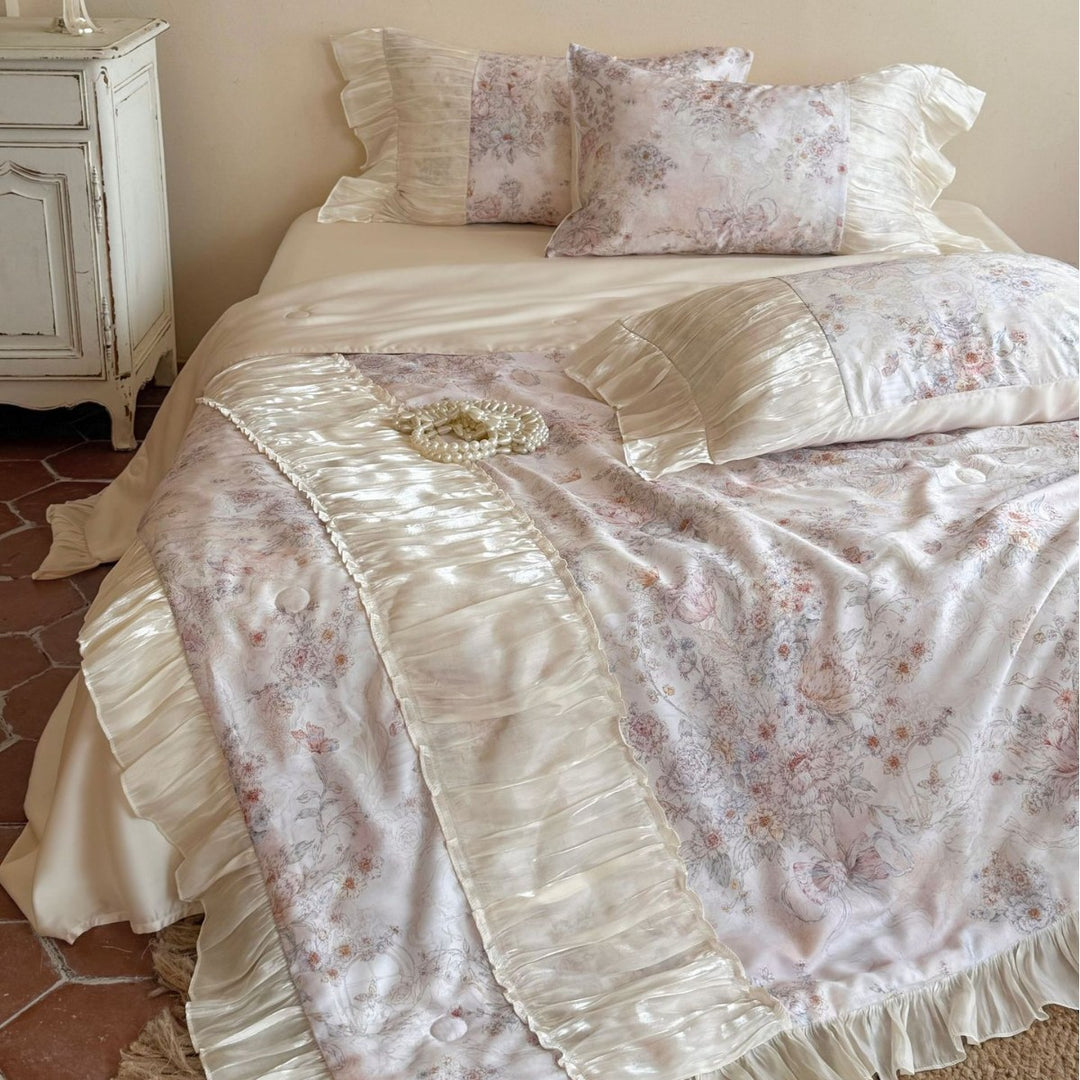 Satin bedding set with floral pattern and pleated ruffles