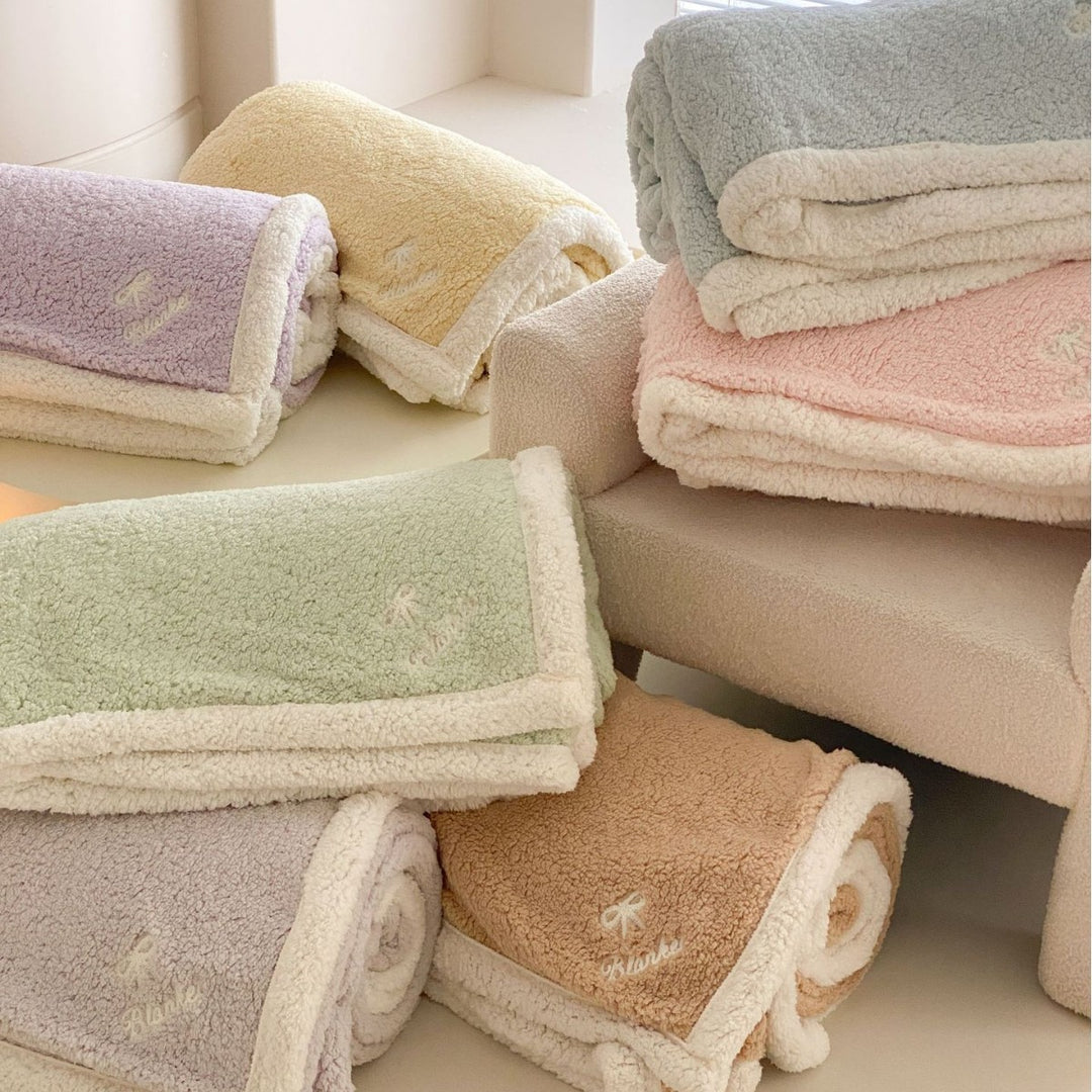 Cozy Sherpa blanket with reversible fleece lining