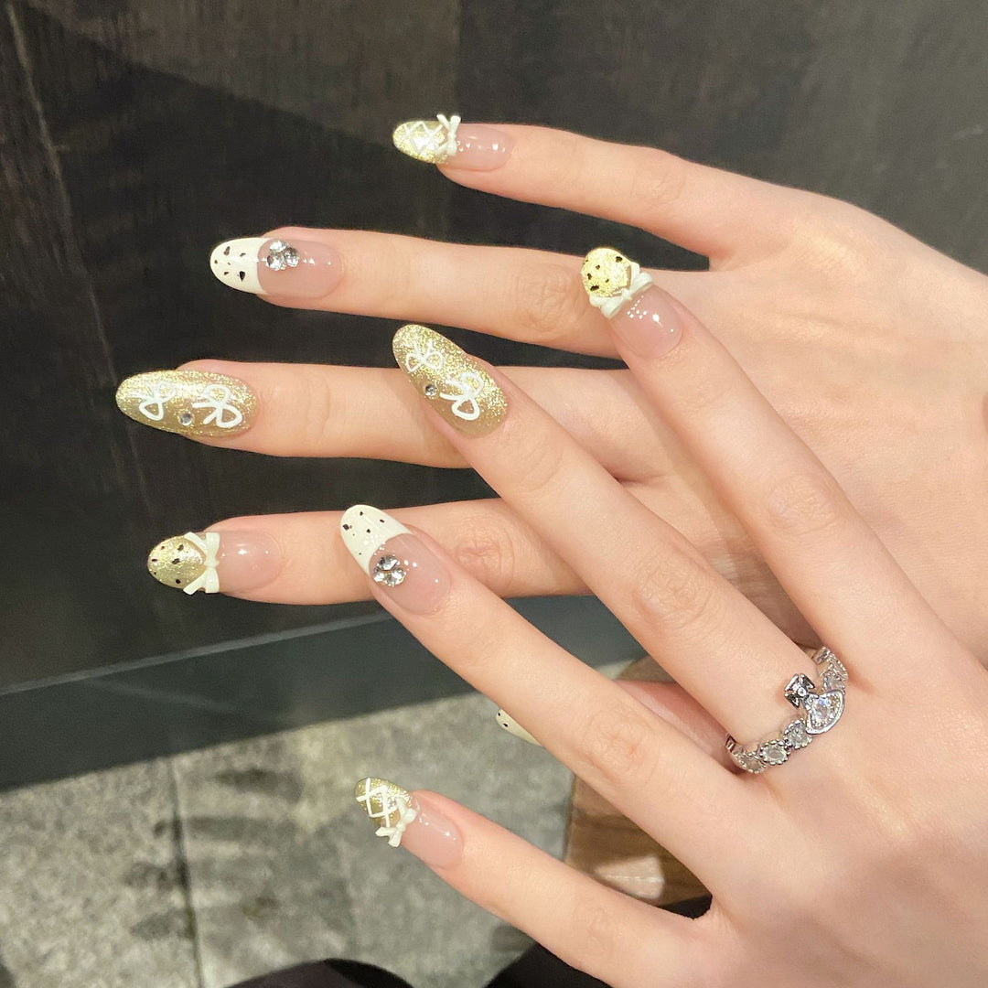 Artistic Press-On Nail Art Set with Charming Bow and Gem Accents
