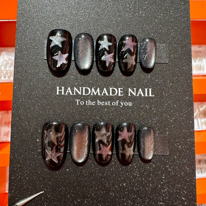 Artistic Press-On Nail Art Set Featuring Handmade Star Designs