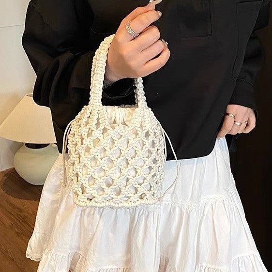 Fashionable handbag made of braided material Kalsten
