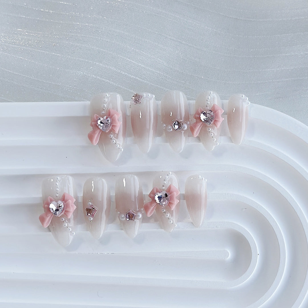 Artistic Press-On Nail Art Set with Heart and Celestial Designs