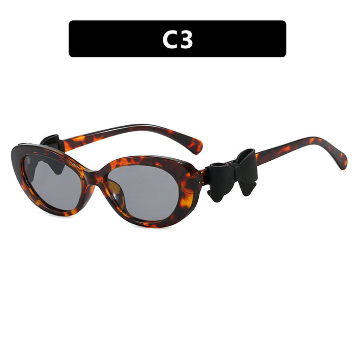 Women's fashionable sunglasses with playful bow design Kalsten
