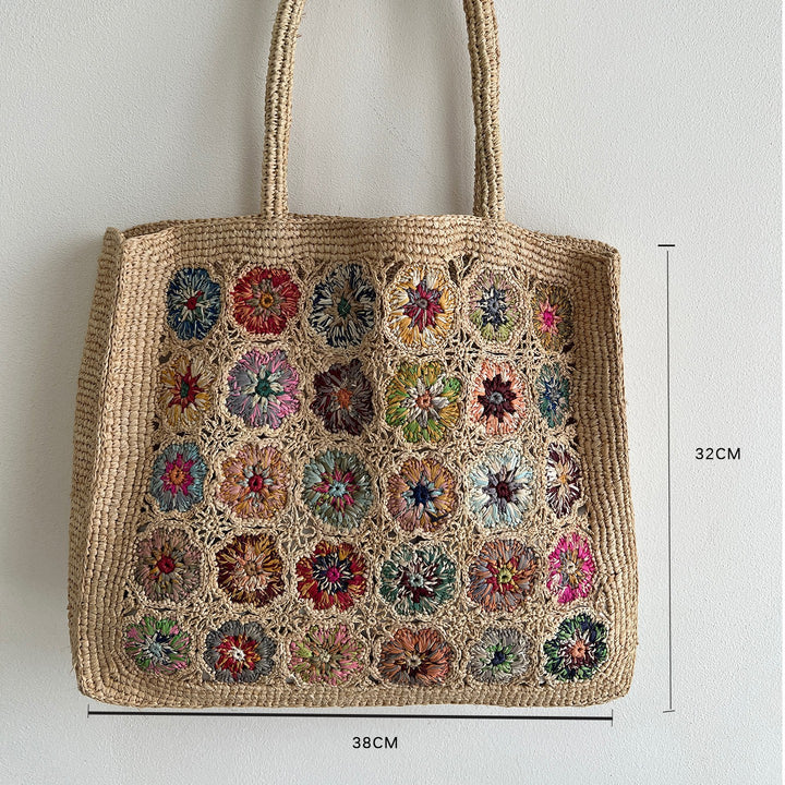 Braided shoulder bag with floral motif Kalsten