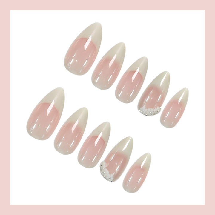 Acrylic nail set with elegant French tip and extravagant decorative details Kalsten