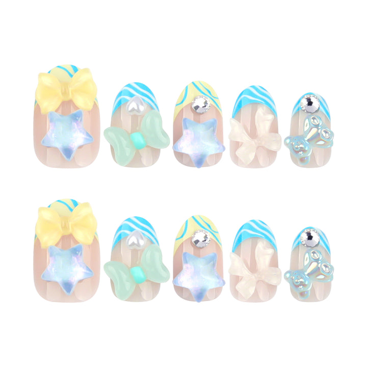 Artificial nail art with colorful pastel designs and 3D embellishments Kalsten