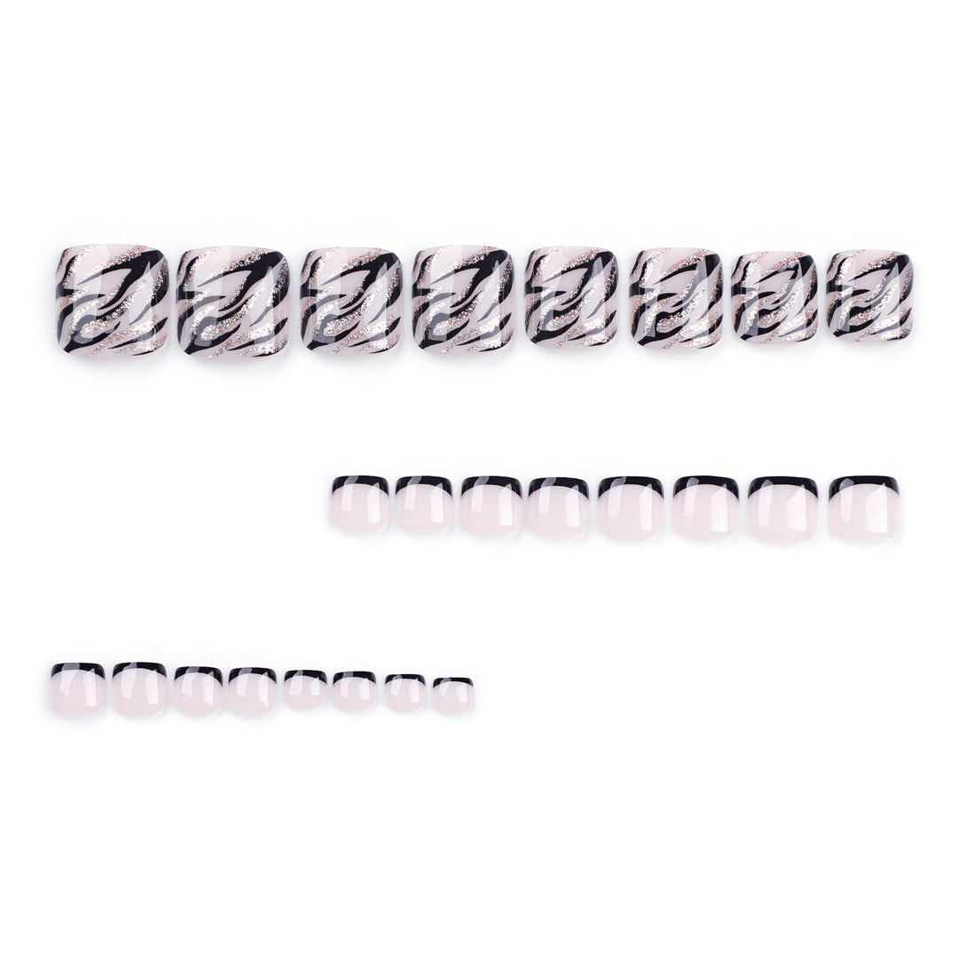 Artificial toenail art in elegant black and white design Kalsten