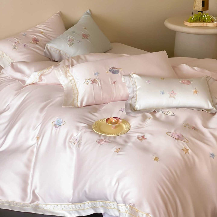 Satin bedding set with embroidered galaxy motif and silky smooth finish