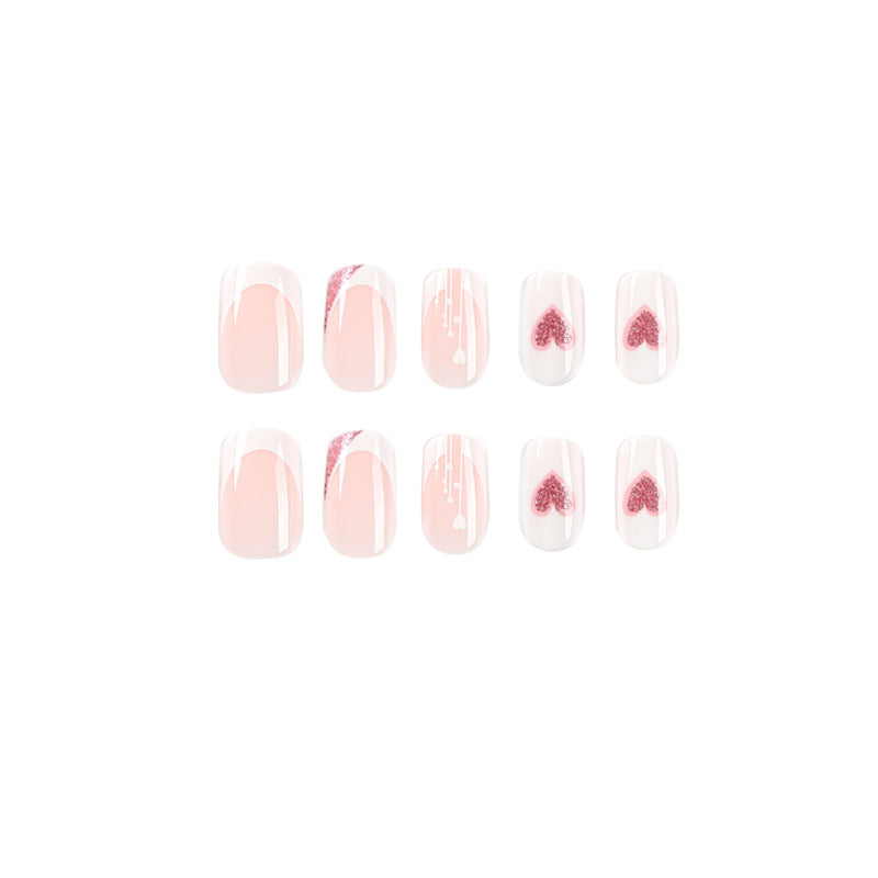 Artful nail designs with heart and glitter accents Kalsten