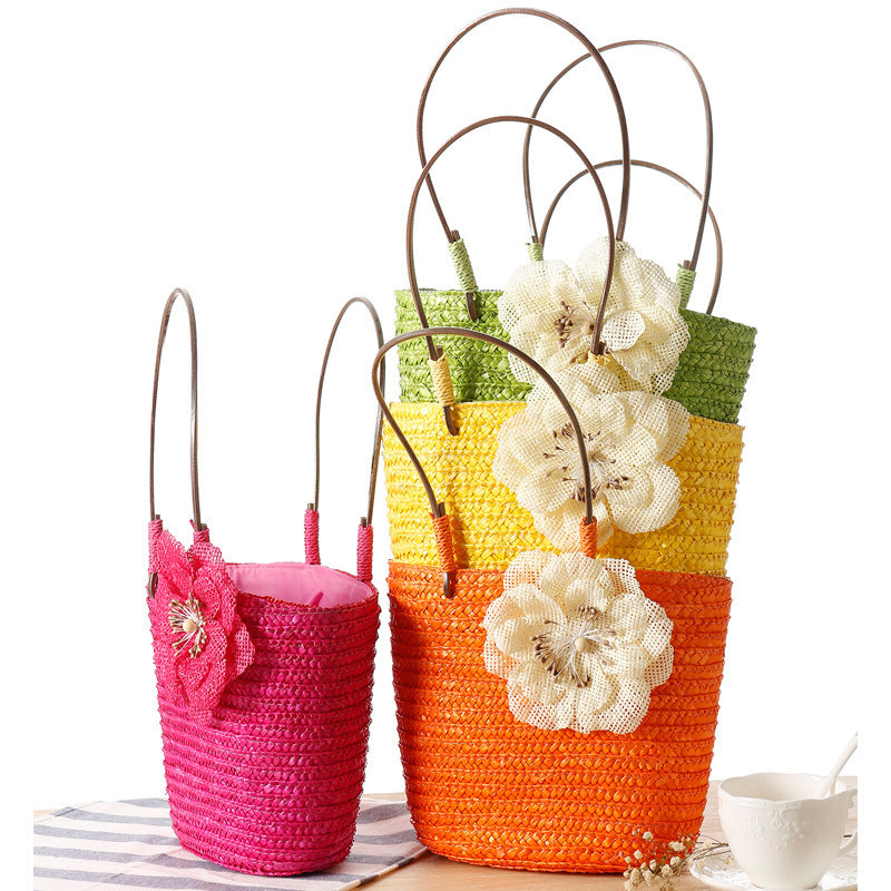 Elegant bast bag with flower appliqué Kalsten