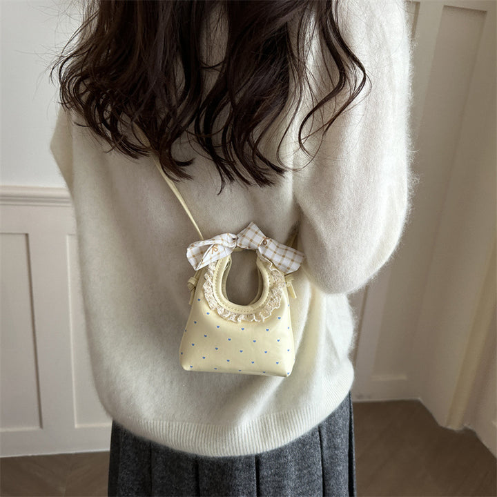 Charming Mini Handbag with Bow Accent