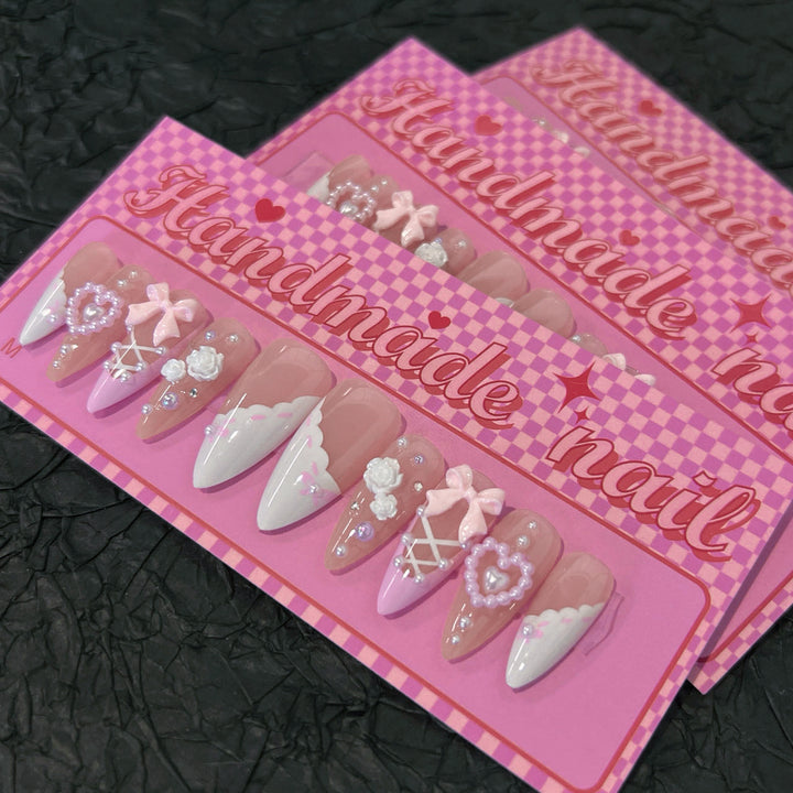 Artful stiletto nails with romantic accents Kalsten