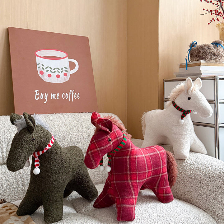 Decorative cuddle horse made of teddy fleece as a decorative and play cushion