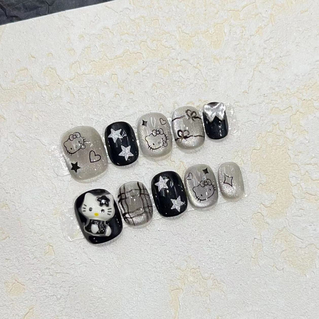 Fun and Whimsical Press-On Nail Set with Cartoon Accents Kalsten