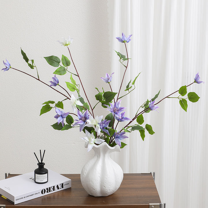 Artificial flower branch with lifelike fig tree leaves