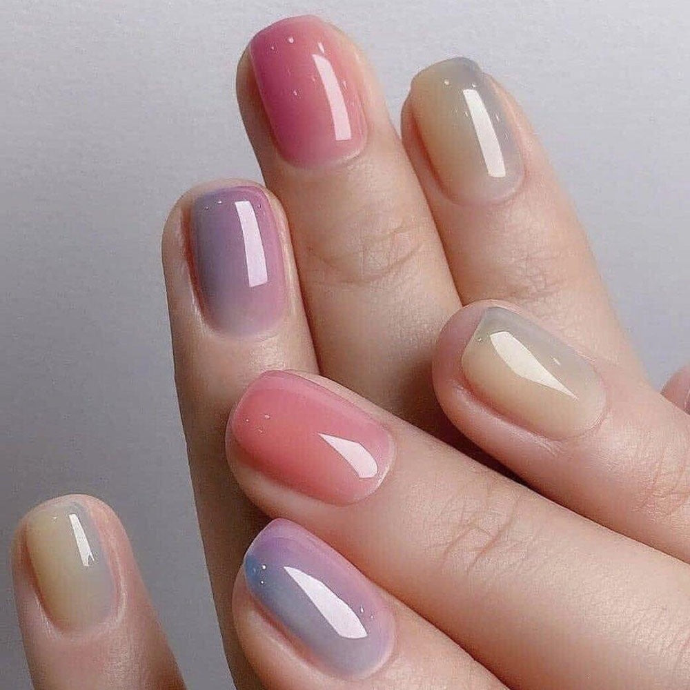 Artificial nails in elegant French tip design Kalsten