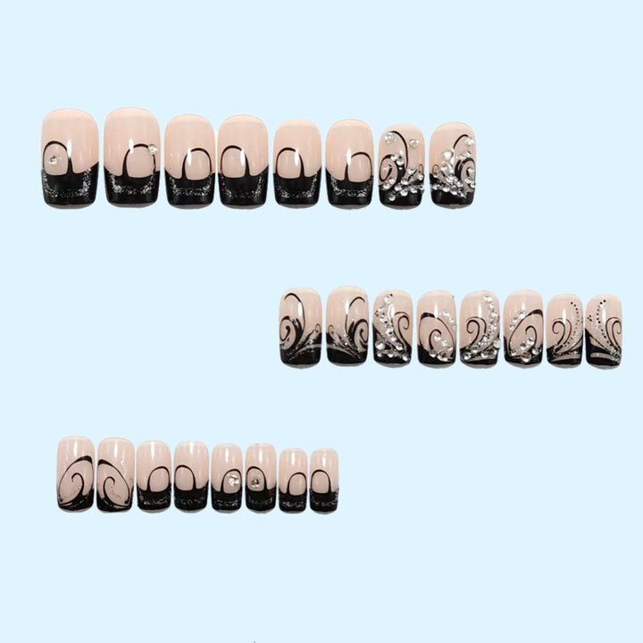 Artificial nails in elegant black-and-white design with glitter applications Kalsten