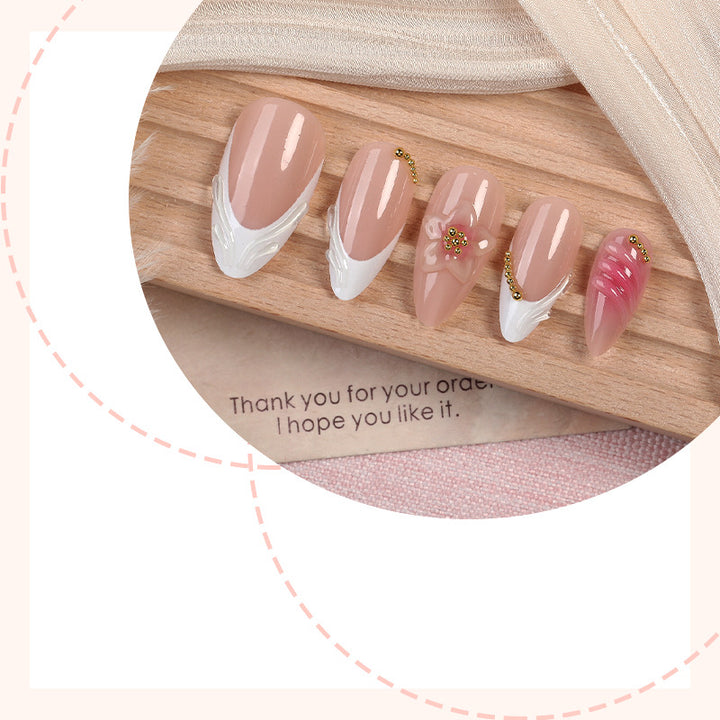 Acrylic nail set with floral design and elegant embellishments Kalsten