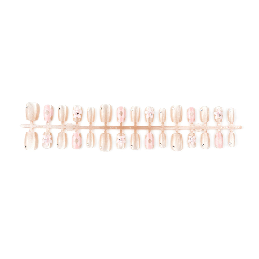 Artificial nail set with floral accents and glitter Kalsten