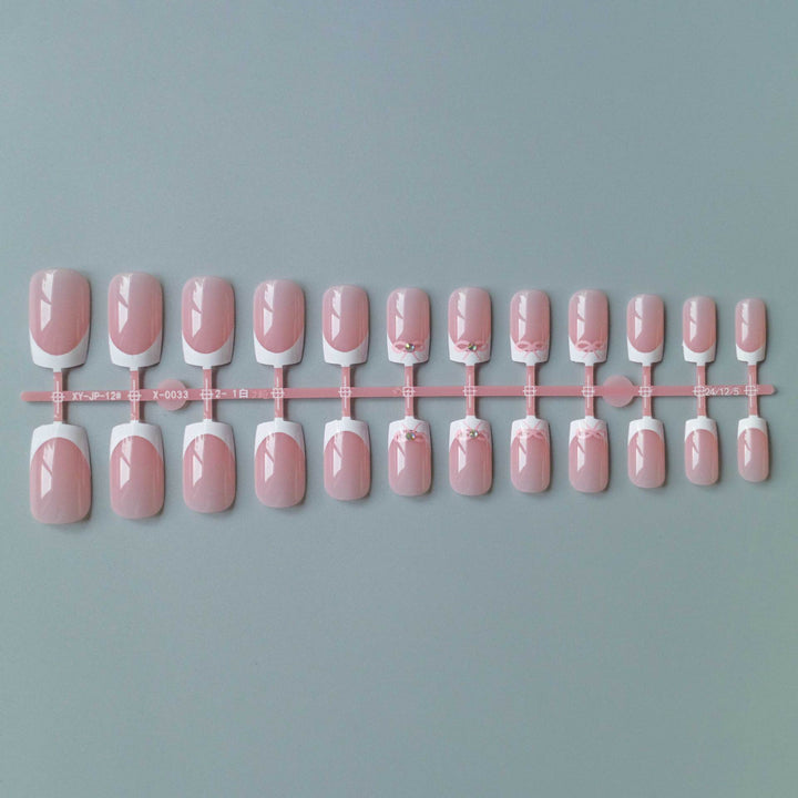 Elegant French Tip Nail Art Set with Delicate Bow Accents