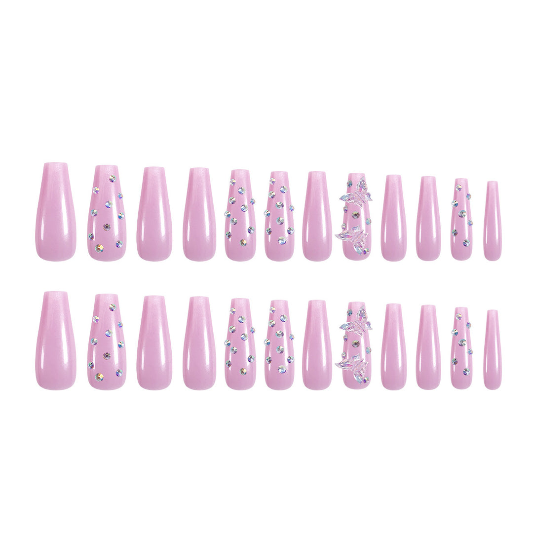 Artistic nail extensions with rhinestone and butterfly adornments Kalsten