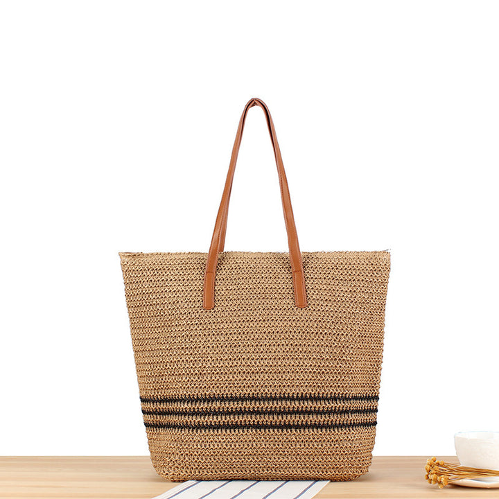 Stylish beach bag made of natural weave with leather handles Kalsten