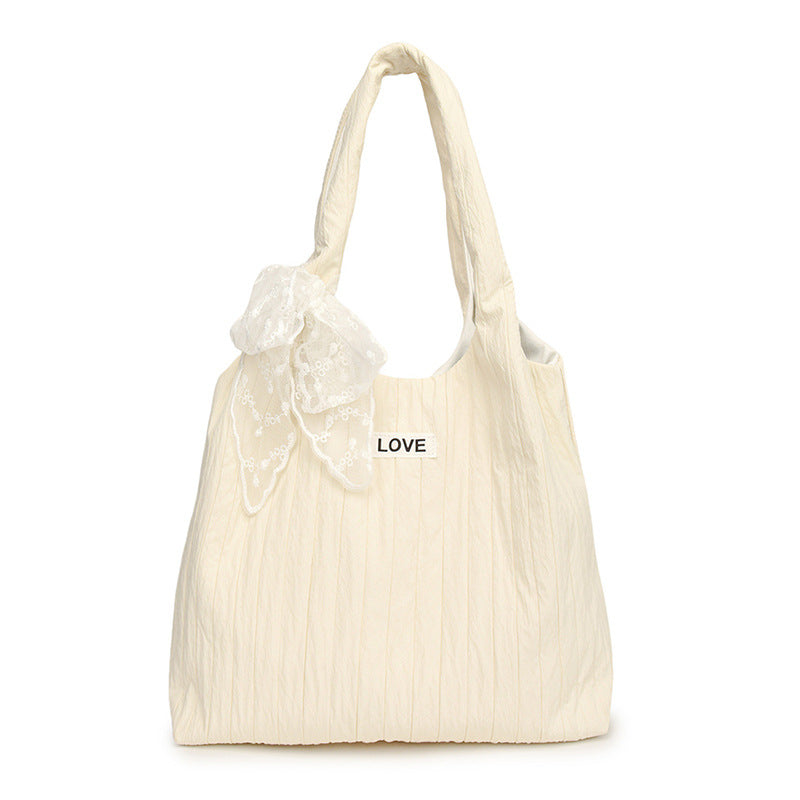 Leisure bag with structured design and playful scarf Kalsten