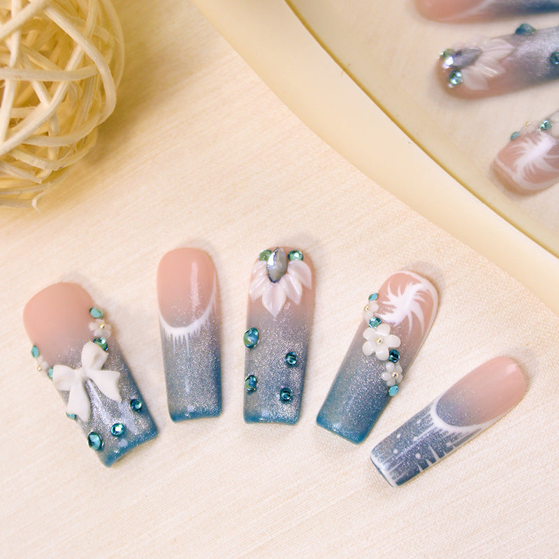 Acrylic nail set with elegant glitter design and fine embellishments Kalsten