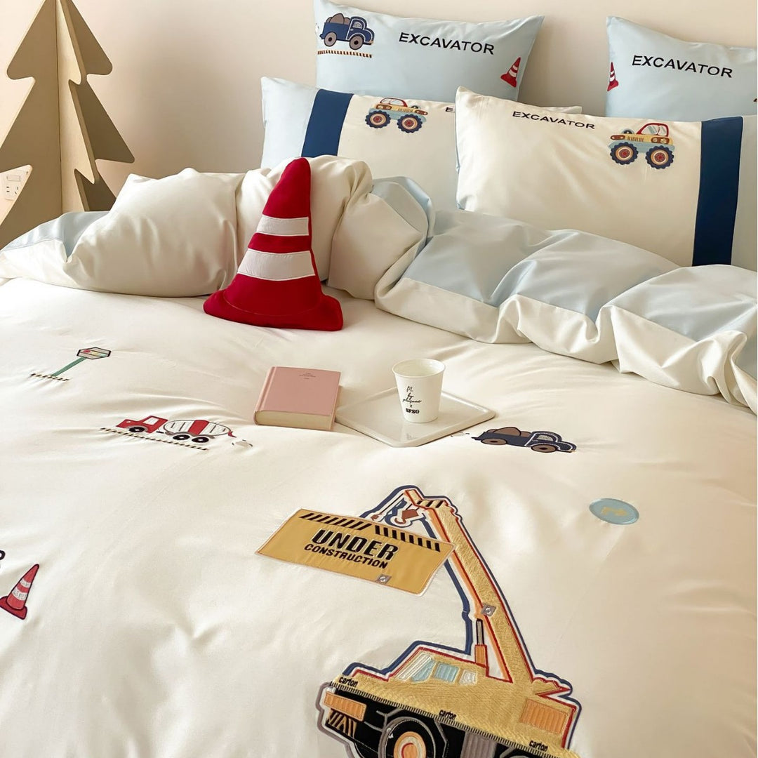 Children's bedding set with detailed construction site motif made from soft cotton satin