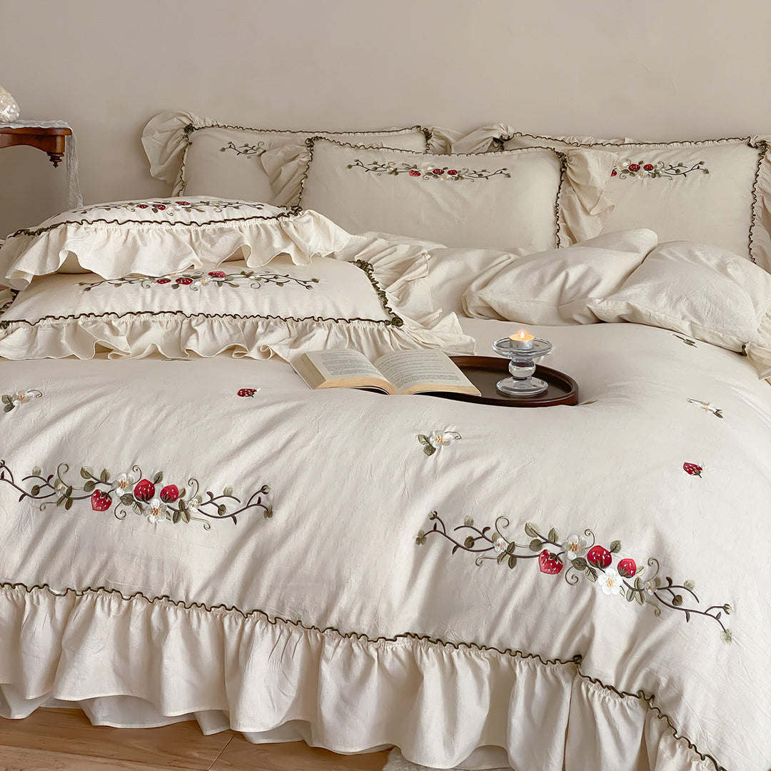 Country house style embroidered bedding set with strawberry motif and ruffle