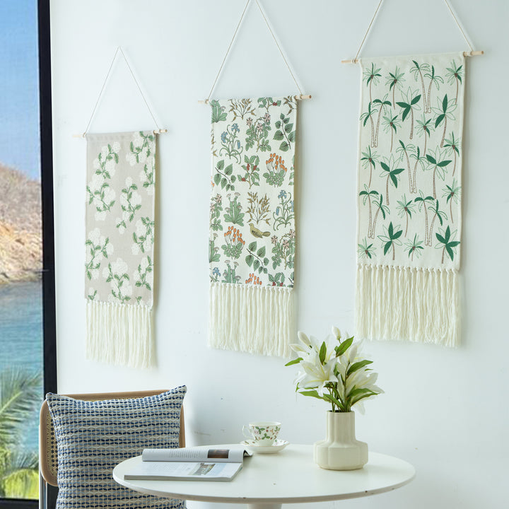 Woven wall tapestry with hydrangea pattern and long fringes