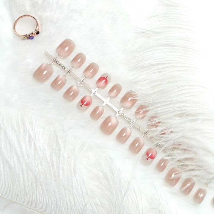 Artificial nails with elegant gradient and glitter accent design Kalsten