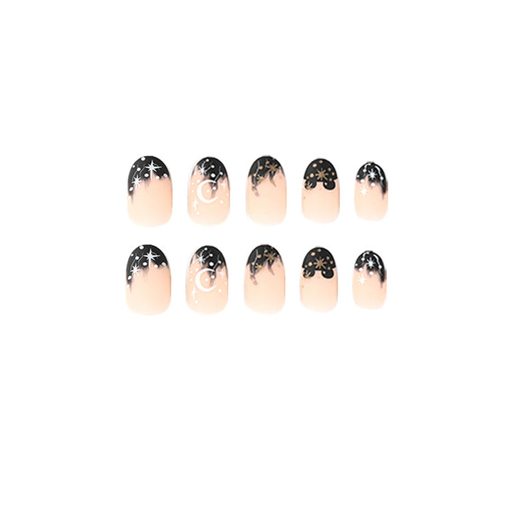 Artistic nail art with moon and star motifs Kalsten