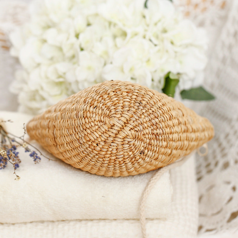 Handcrafted straw clutch with elegant design Kalsten