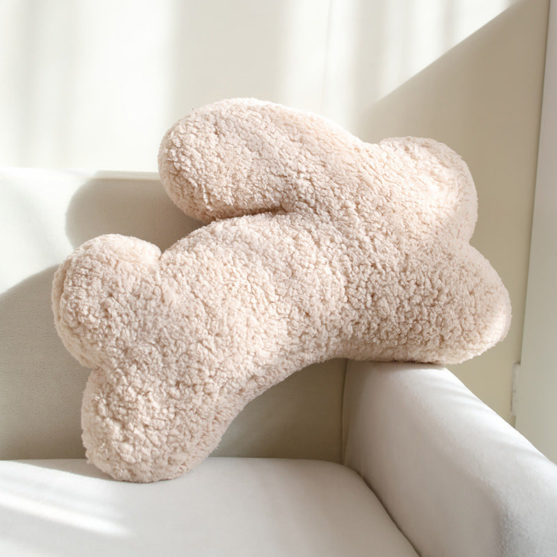 Padded seat cushion in flower shape with faux leather center piece and fluffy edge padding