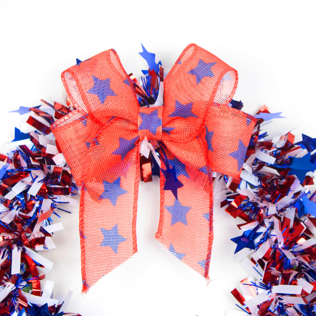 Unisex decorative door wreath with star confetti and large bow Kalsten