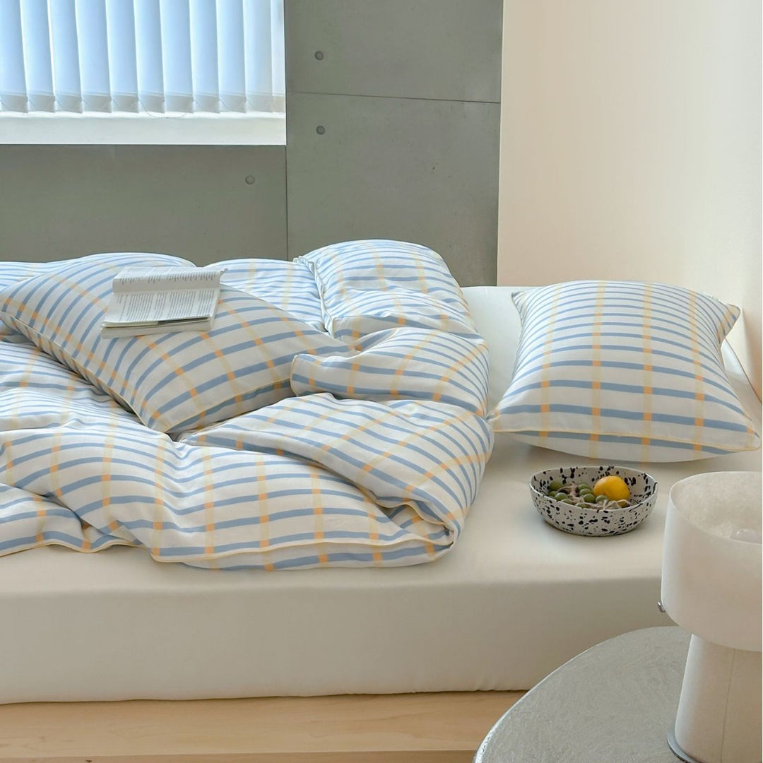 Soft cotton satin bedding with fine check and stripe pattern