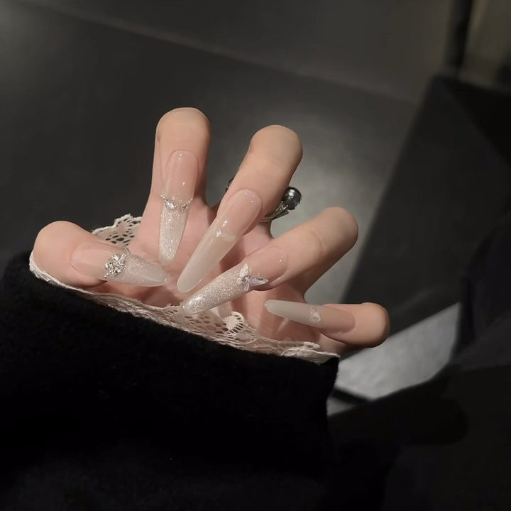Glamorous Stiletto Nail Extensions with Rhinestone Accents