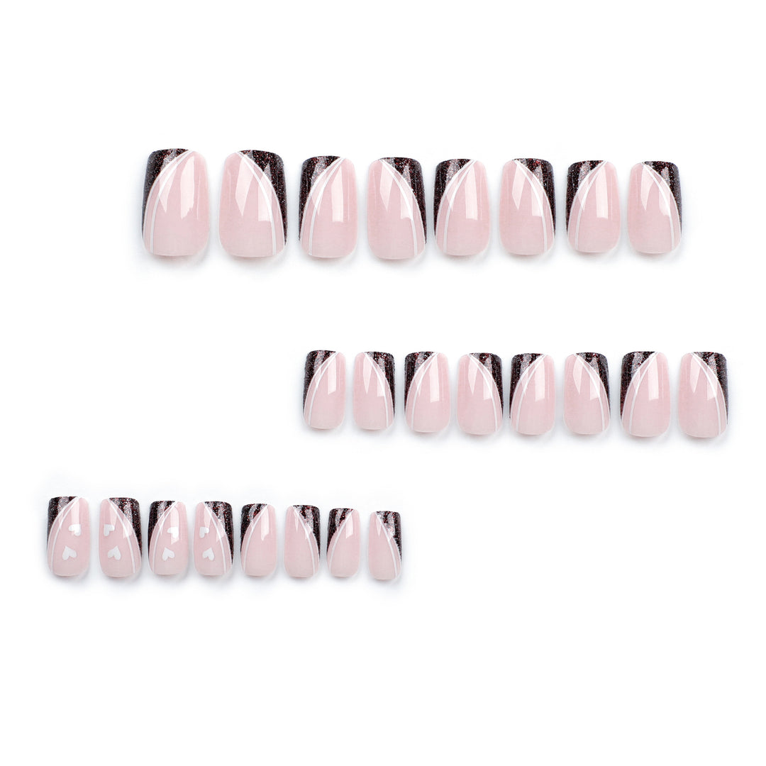 Artistic Nail Art with Elegant Glitter and Heart Design Kalsten